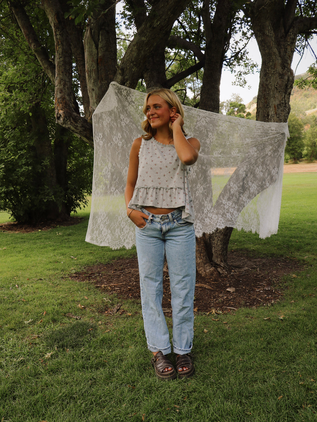 ROUND NECK RUFFLE HEM TANK
